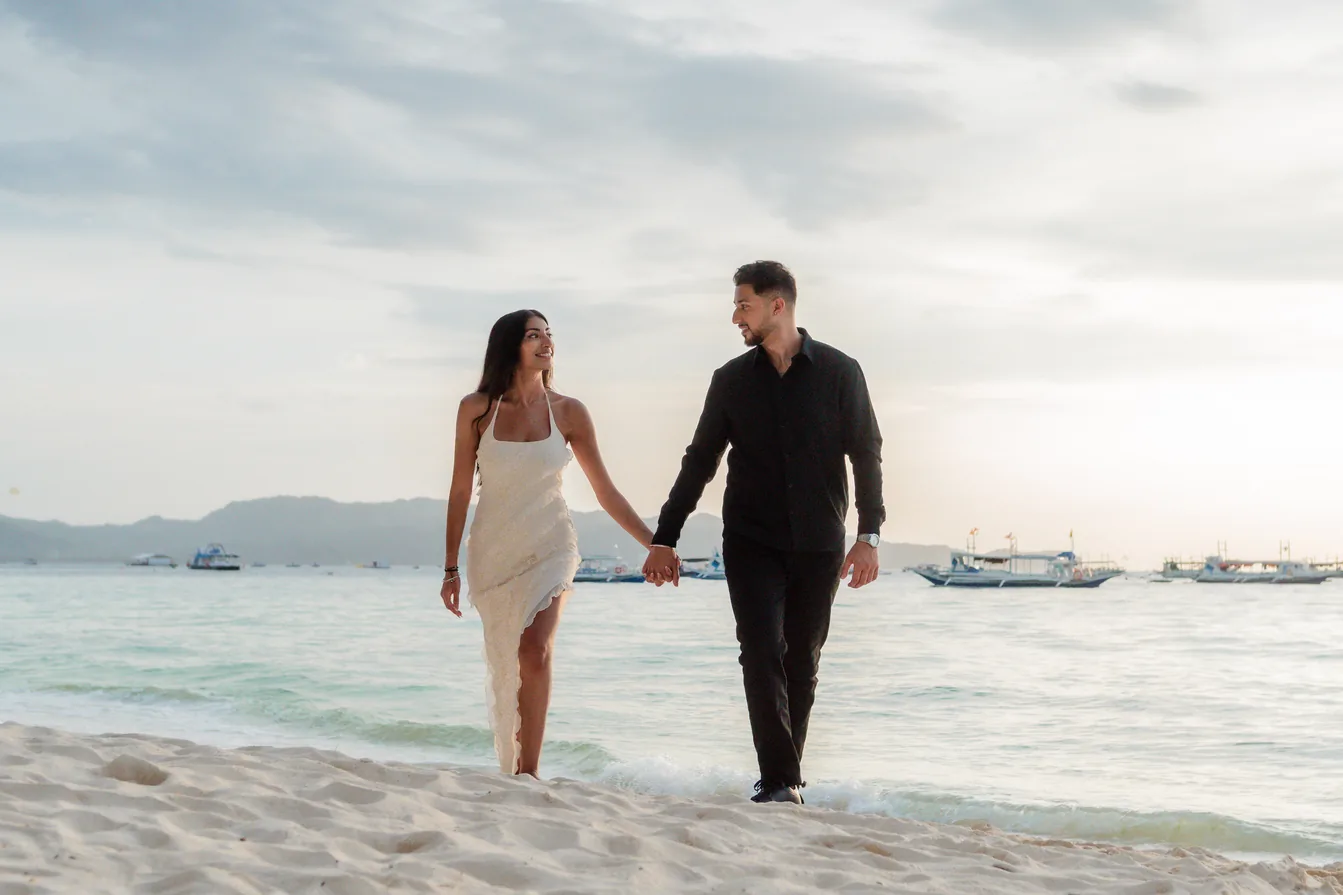 Sachin and Kierath walking along the beach